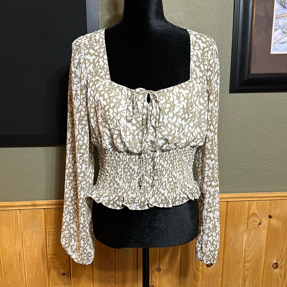 Nine Britton cheetah blouse